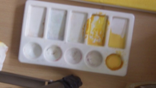 Painting Pallette with the Yellow Ocre paint mixed with a dash of water for the glaze!