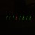 Dark and eerie glowing green LED indicator lights