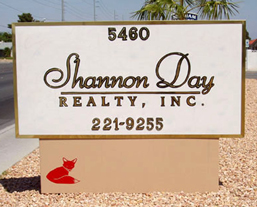 Shannon Day Realty sign, with the little red fox on the sign.