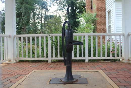 The water pump where Helen escaped her darkness as it stands today, at her childhood home at Tuscumbia, Alabama. ©MBG