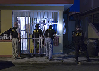 Photo of a raid taking place as part of the Drug Enforcement Agency's Operation Mallorca