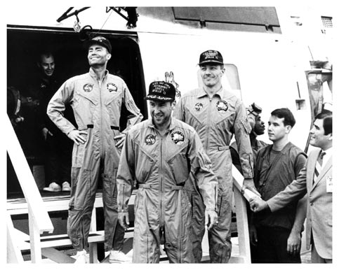 The crew of Apollo 13 following a successful re-entry and splashdown.
