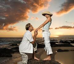 Yes, down on the knee, the standard way of proposing to your girl. And at sunset. Did you plan that, dude?
