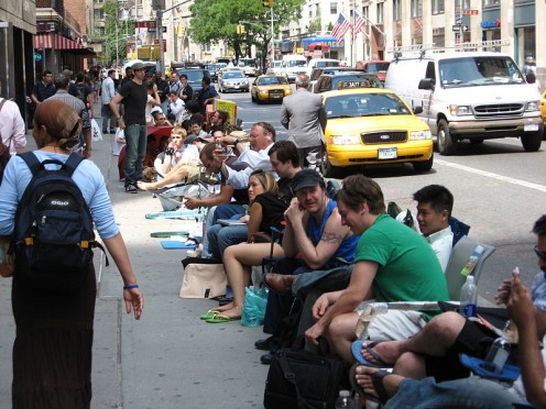 Eager iphone customers lining up outside a Broadway store in 2007