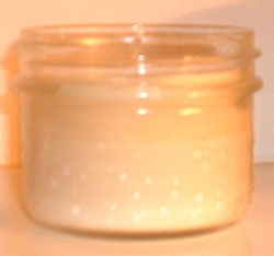 a candle made from a jelly jar.