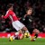 Andre Arshavin gets tackled by Lucas Leiva Andre Arshavin gets tackled by Lucas Leiva