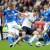 Gareth Bale getting tackled by a defender Gareth Bale getting tackled by a defender