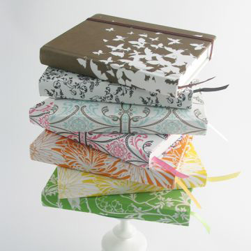 A stack of eco-friendly journals.