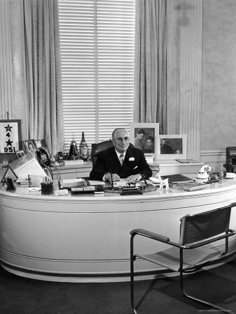 Louis B. Mayer, Sitting at His Office Desk, by Walter Sanders