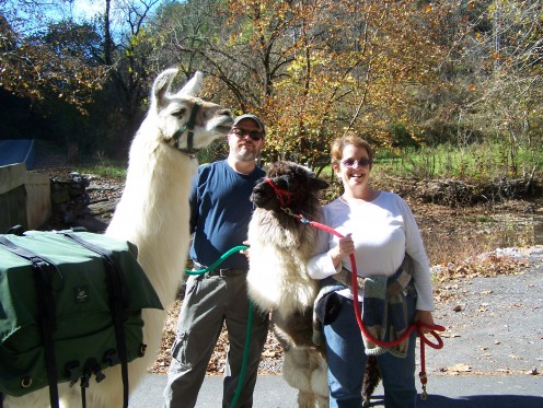 My husband with Woody the Llama and me with Peanut the Alpaca