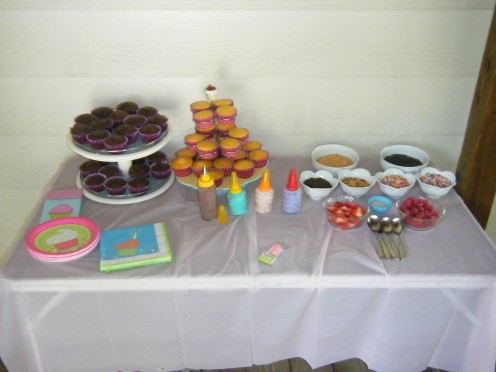 A cupcake decorating station is a great birthday party idea. 