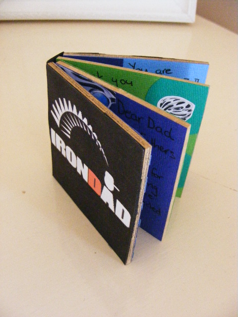 A card made out of board for Fathers Day for a triathlete dad