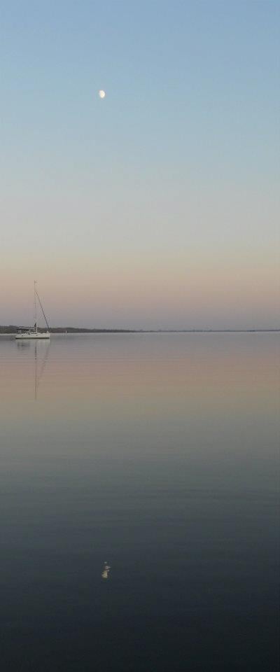 Sailboat on Sunset Waters. Pinney's Point. ©2011 Sarah Haworth.