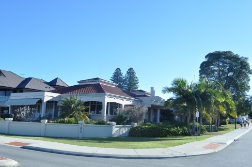 then we come back home to our white suburbs tucked safely among the high-priced apparments near the beach