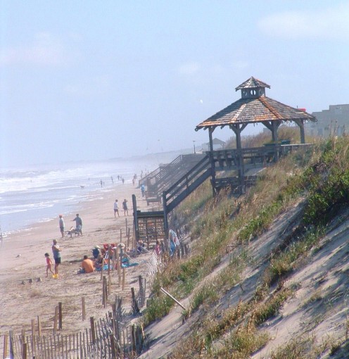 Wooden Structures Along Sand Dunes.
