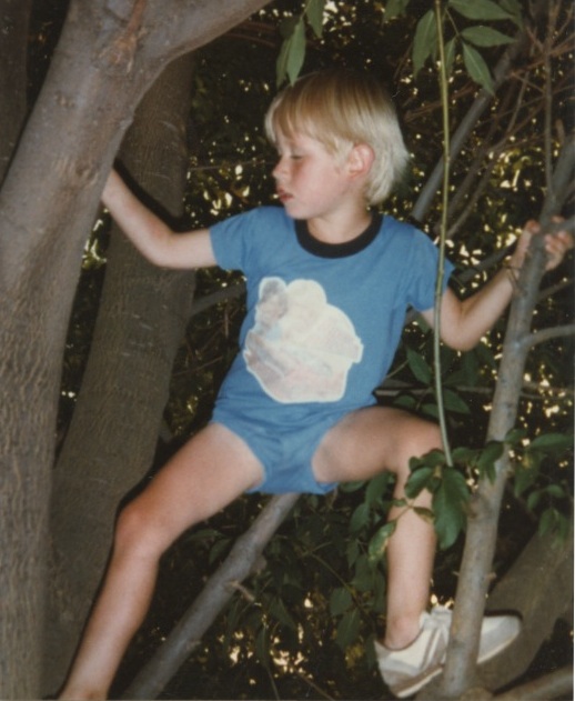 This is my son Jason when he was still our foster child. He loved the tree in our front yard and spent a lot of time there.