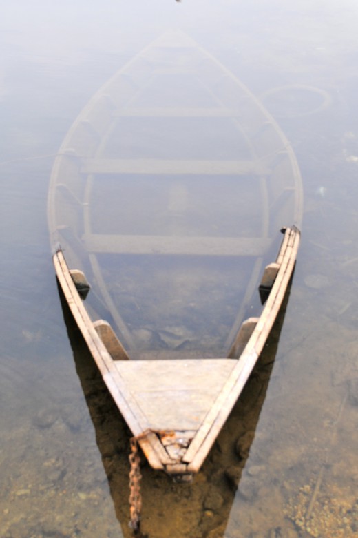 Deserted row boat in Phewa Lake, Pokhara.
