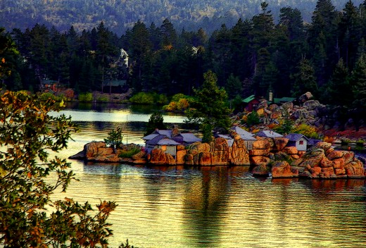 A  bright golden sunset luminates Boulder Bay, in Big Bear Lake...made all the more intense with Photo shop enhancements..