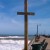 This post was part of the fish cleaning area but I thought it made a stunning cross with the ocean as background.