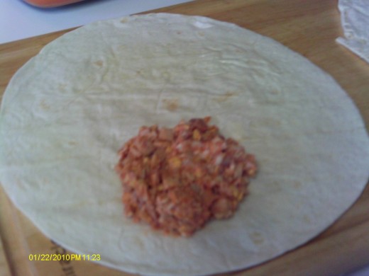 Place 1/4 c mixture onto the tortilla shell