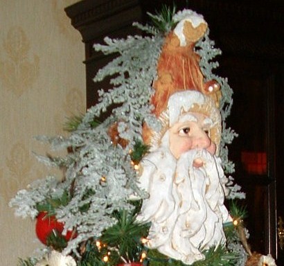 Top of Santa themed tree.