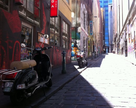 The entrance to Hoiser Lane, looking from Flinders street. The premise next to where the little black scooter is parked is actually a quaint restaurant and cafe