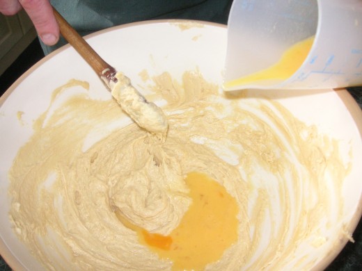 Gradually Add The Beaten Eggs, A Little At A Time.