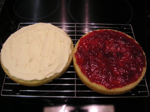Cover One Half With Jam, The Other With Butter Cream And Sandwich Together.
