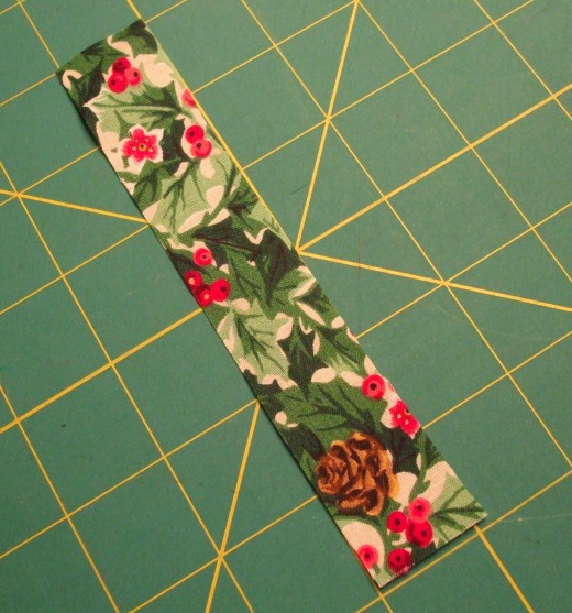 Use a scrap of fabric about 1 x 6 inches large.