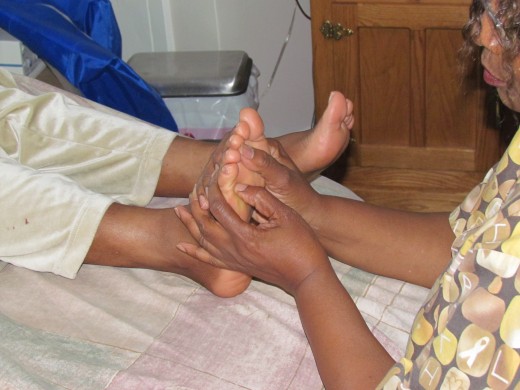 Treatment of reflexology continues as Thelma, focuses on certain areas of my body through my feet.