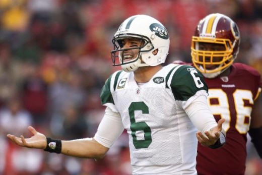 New York Jets quarterback Mark Sanchez reacts after a play during the second half of an NFL football game against Washington Redskins in Landover, Md., Sunday, Dec. 4, 2011. (AP Photo/Evan Vucci)