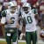 New York Jets wide receiver Santonio Holmes, right, runs off the field with quarterback Mark Sanchez after scoring a touchdown on a pass from Sanchez during the second half of an NFL football game against the Washington Redsk insin Landover, Md., Sun