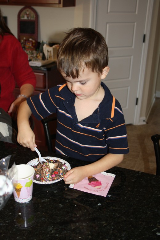 My son with his ice cream.  Not sure I could have eaten one spoon full of that wonderful mixture.