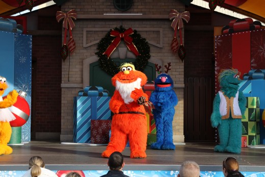 Sesame Street's Murry in holiday gear for the show