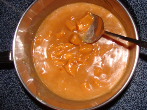 Melt the caramel slowly while stirring continuously.