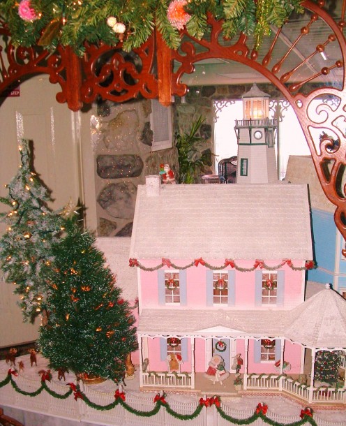 Large Victorian style doll house in lobby.