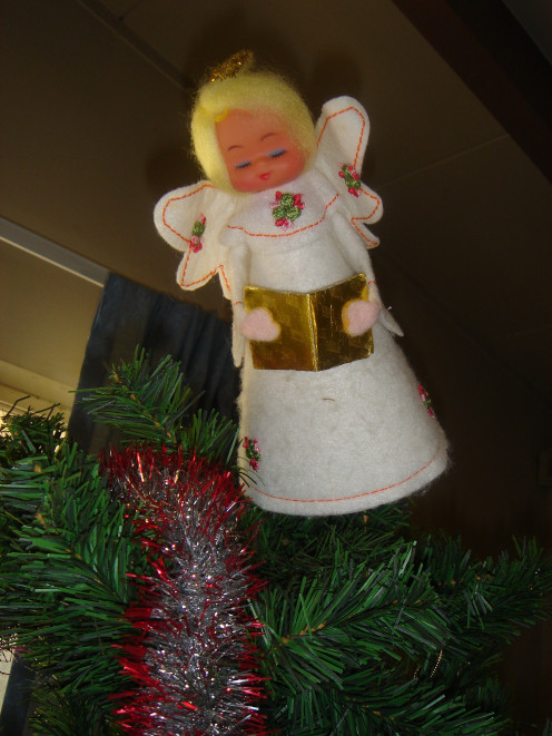 My Great Aunt Betty's Angel Christmas Tree Topper.  We love Aunt Betty, and will miss seeing her this Christmas, and everyone else. 