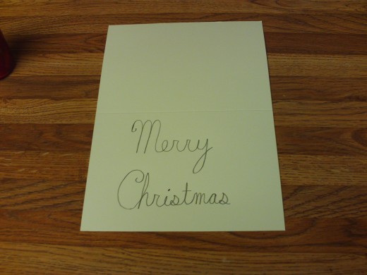 On the first card I wrote Merry Christmas in cursive handwriting.
