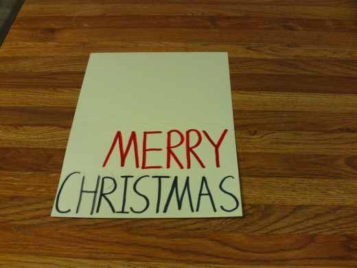 I wrote Merry Christmas with red and grey markers.