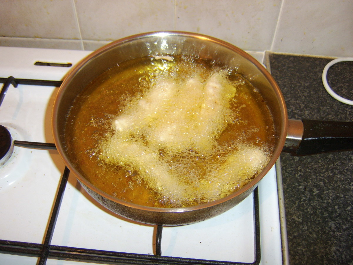 Deep frying the chicken dippers
