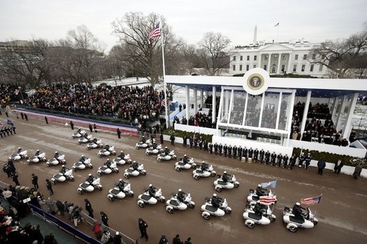 The Inaugural Parade down Pennsylvania Avenue past the President's reviewing stand in front of the White House on January 20, 2005. Credit: White House public domain photo