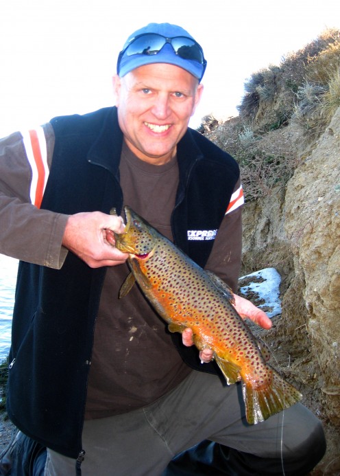 Angler David Griffin with a Beautiful Brown Trout caught in a Colorado Lake. 