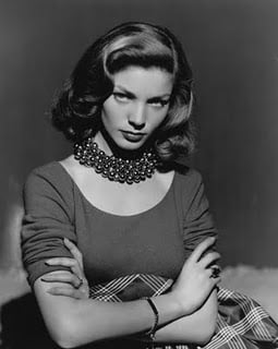 Lauren Bacall in rows of beads