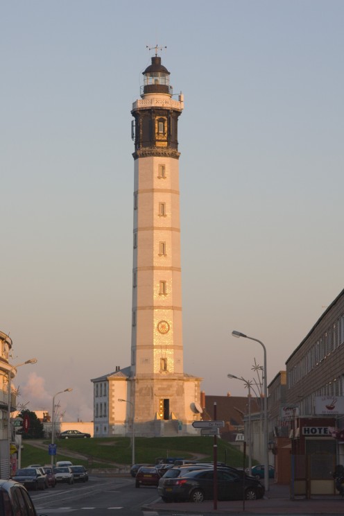 The Calais lighthouse, reflecting the sunset.