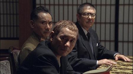 The great direcot/actor Takashi "Beat" Kitano is in the front.  He plays the representation of logic and in my opinion is greatly underused in the film.