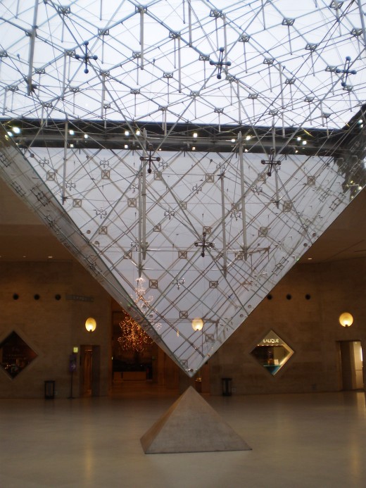 Below the pyramid entrance at the Louvre.