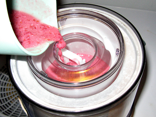 Raspberry gelato ingredients being added into the bowl 