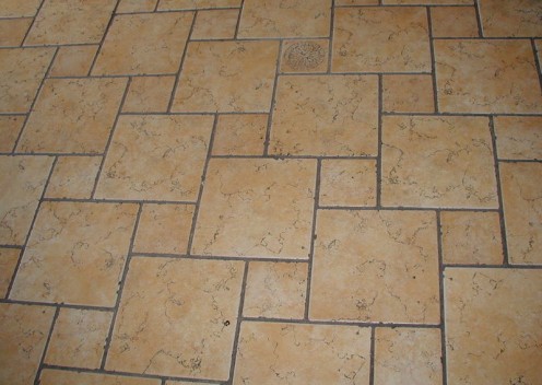 Mud mortar forms a strong base for a ceramic tile floor, and tile floor installations create durable, long-lasting floors.
