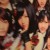 A blurry look at some AKB48 stuff plastered on the walls