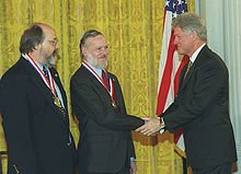 Receiving the National Medal of Honor from President Clinton
